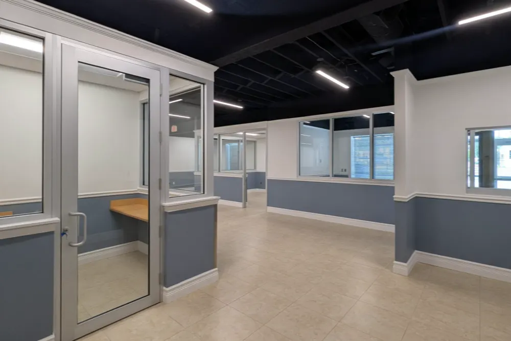 Glass-front private offices built by our team on 8th Street West in Bradenton