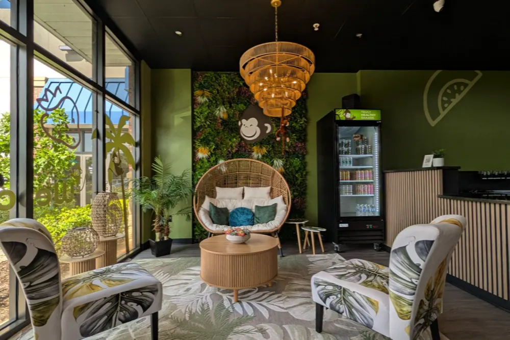 Lounge seating area with murals